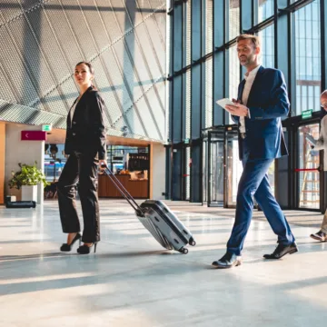 Business People at Airport Hall